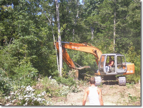 Castle Construction clearing the lot.